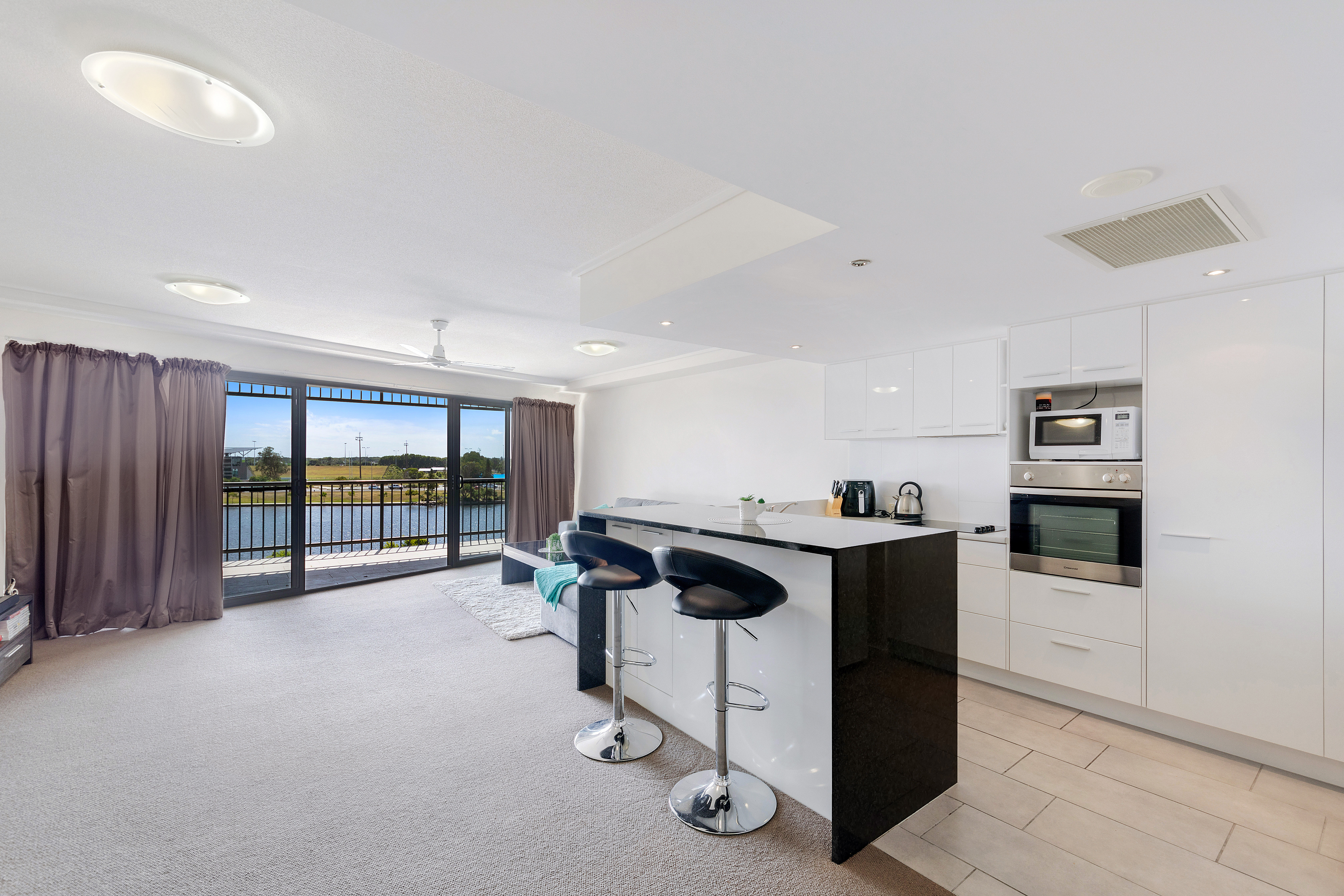 IMMACULATE UNIT WITH ALL THE BELLS & WHISTLES! Code Property Group