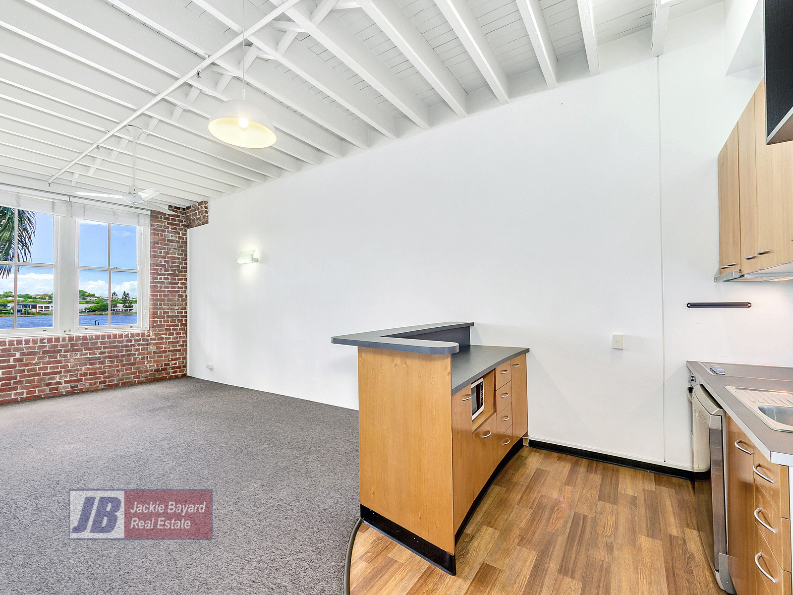 Jackie Bayard Real Estate DIRECT RIVERFRONT WOOLSTORE!