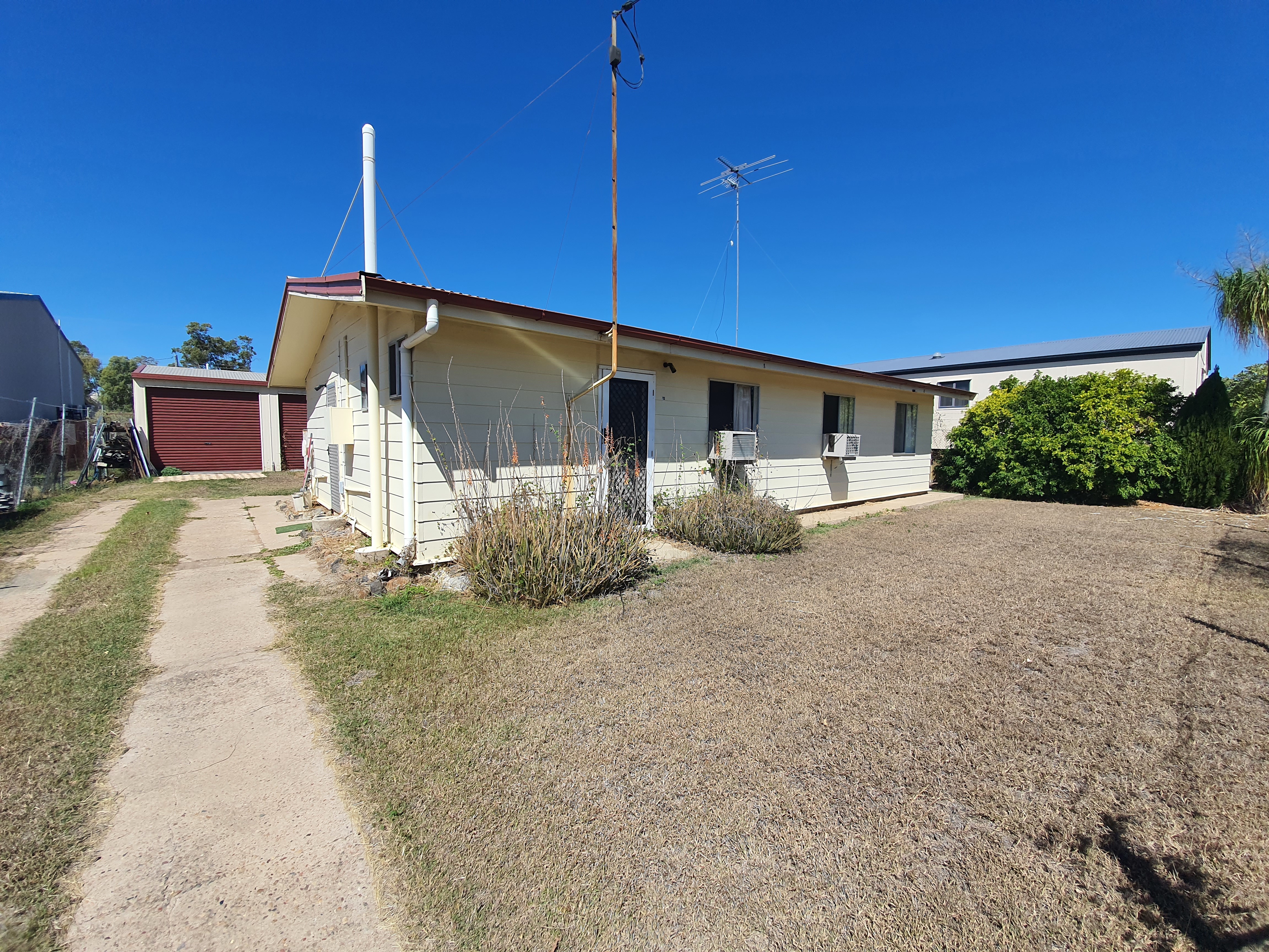 Moura Real Estate Double Commercial Block with House and Workshed