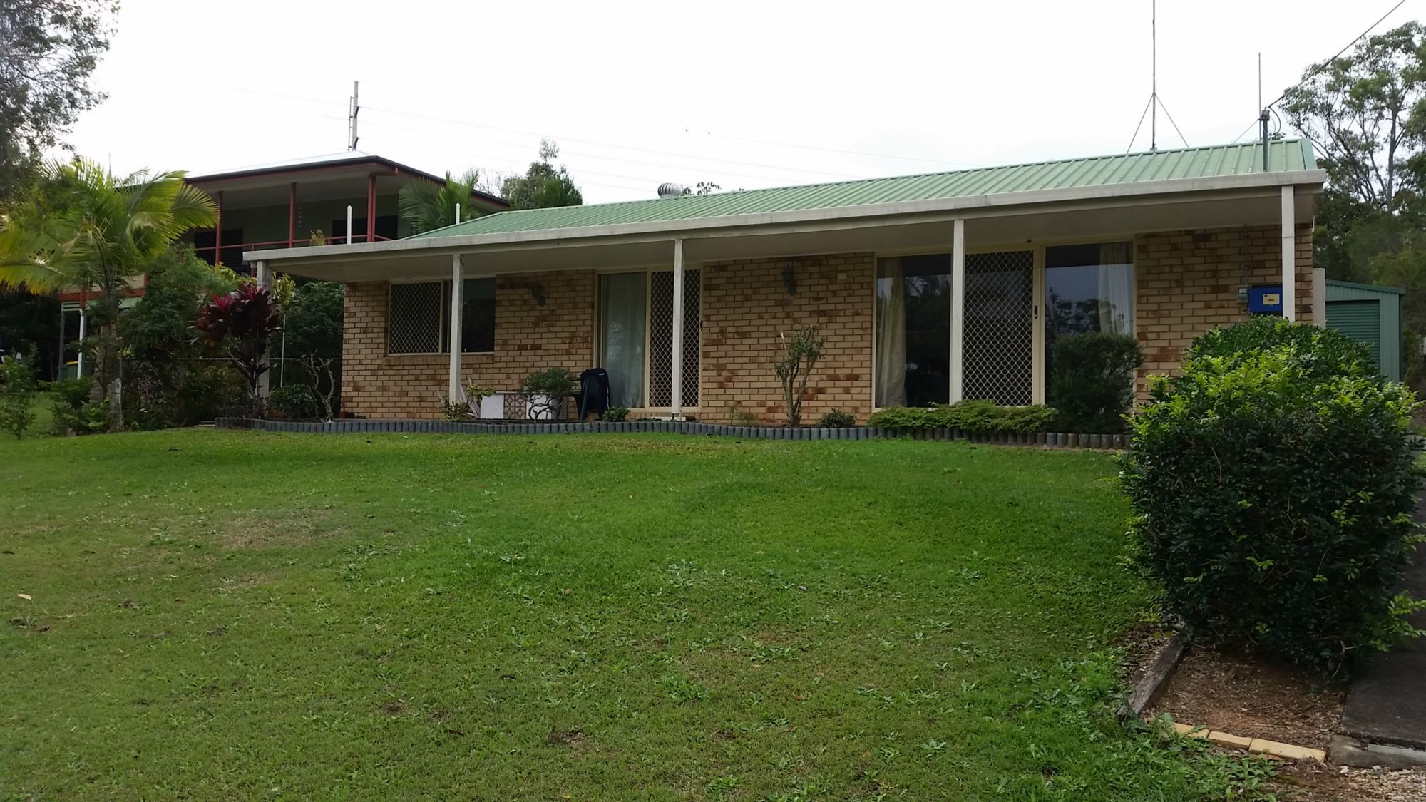 Russell Island Real Estate Good family home with a large shed.