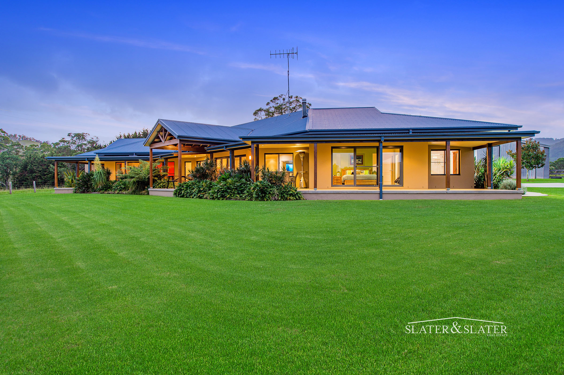 Slater & Slater Real Estate Prime riverfront acres with impressive home