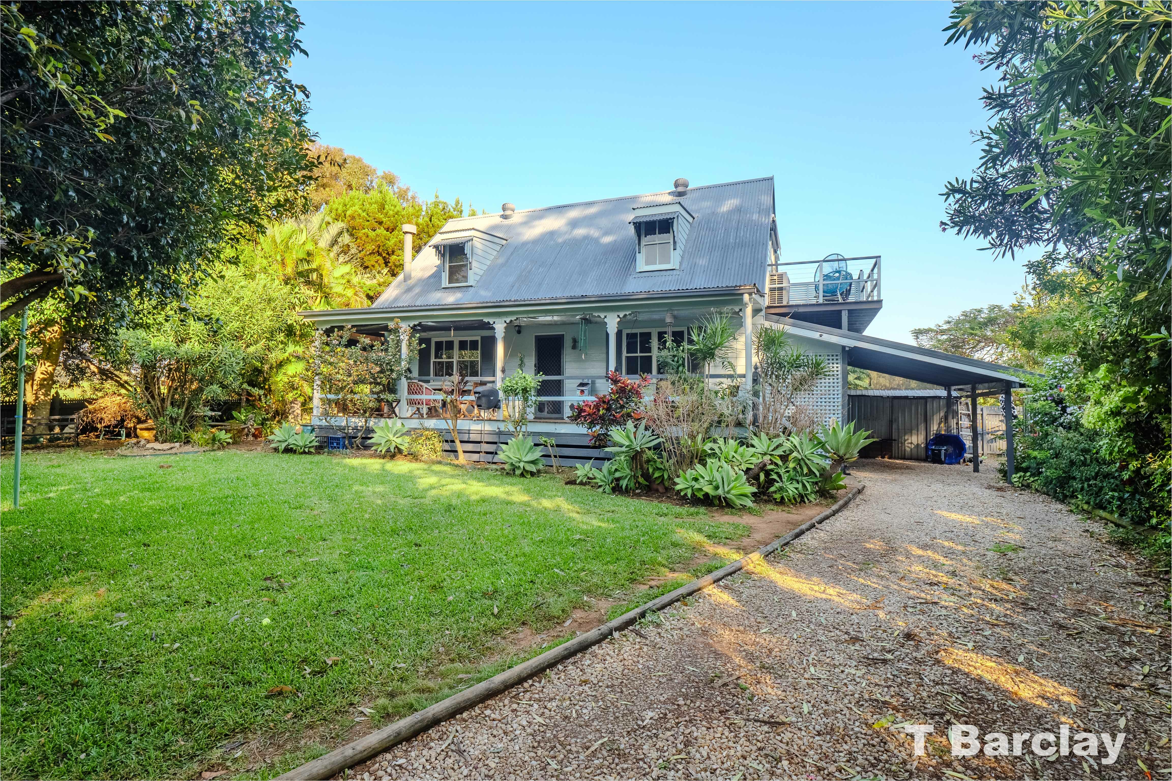 T.Barclay Real Estate Charming Character Cottage with Bay Views and