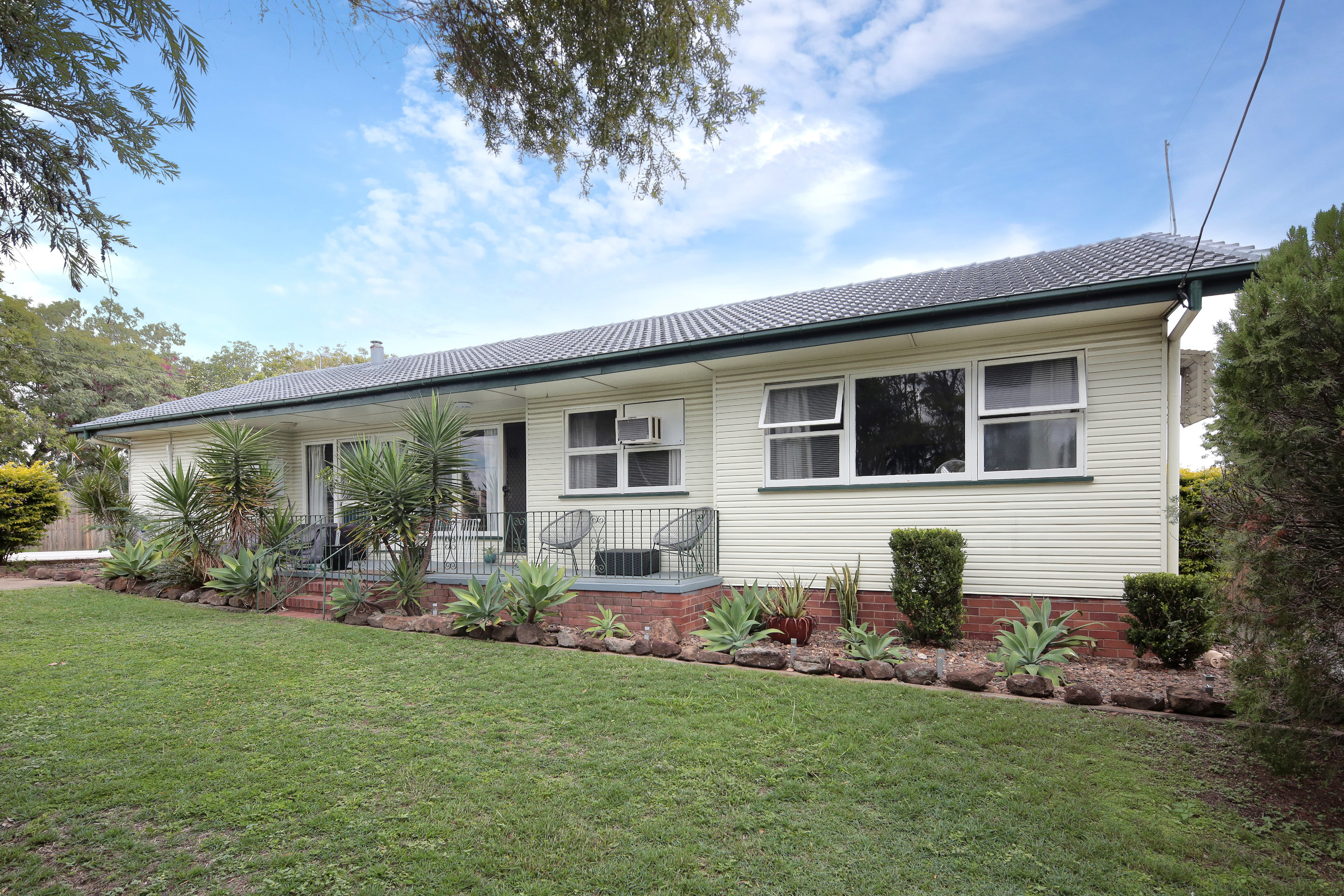 Walkers Real Estate NEAT 4 BEDROOM WITH SHED